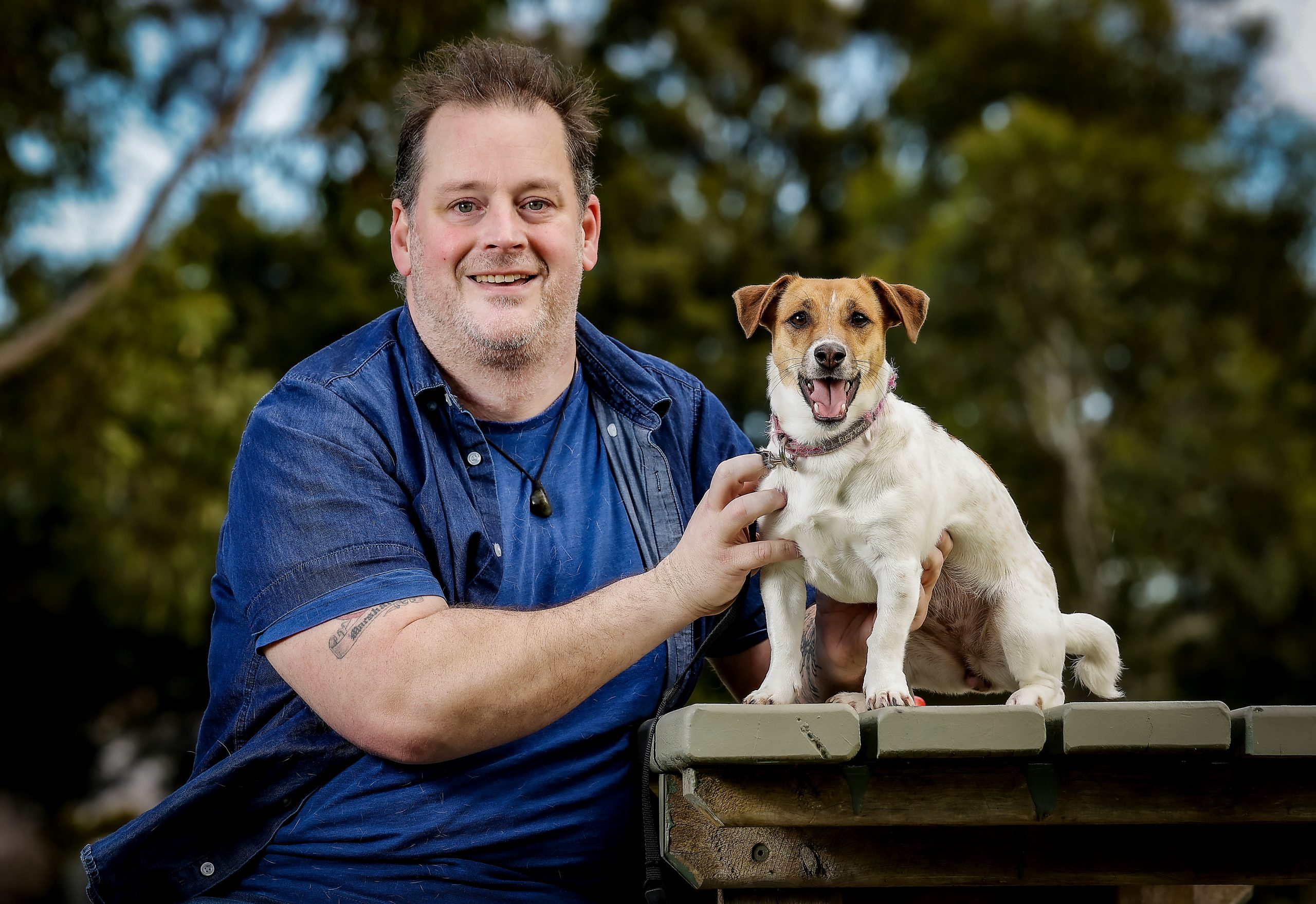 Vaughn Marshall poses with his Jack Russell dog 'Luna.'