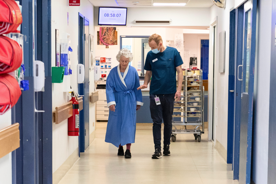 Image: Emmett McKenna with Valerie, a patient on Walker Ward, Rosebud Hospital